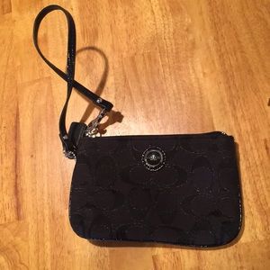 COACH black wristlet. Make an offer today!